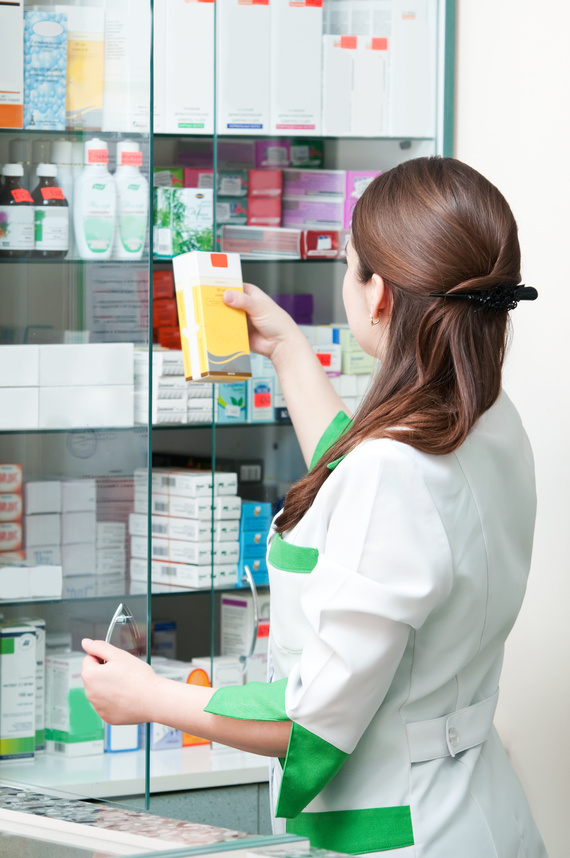 Pharmacy Chemist Woman in Drugstore