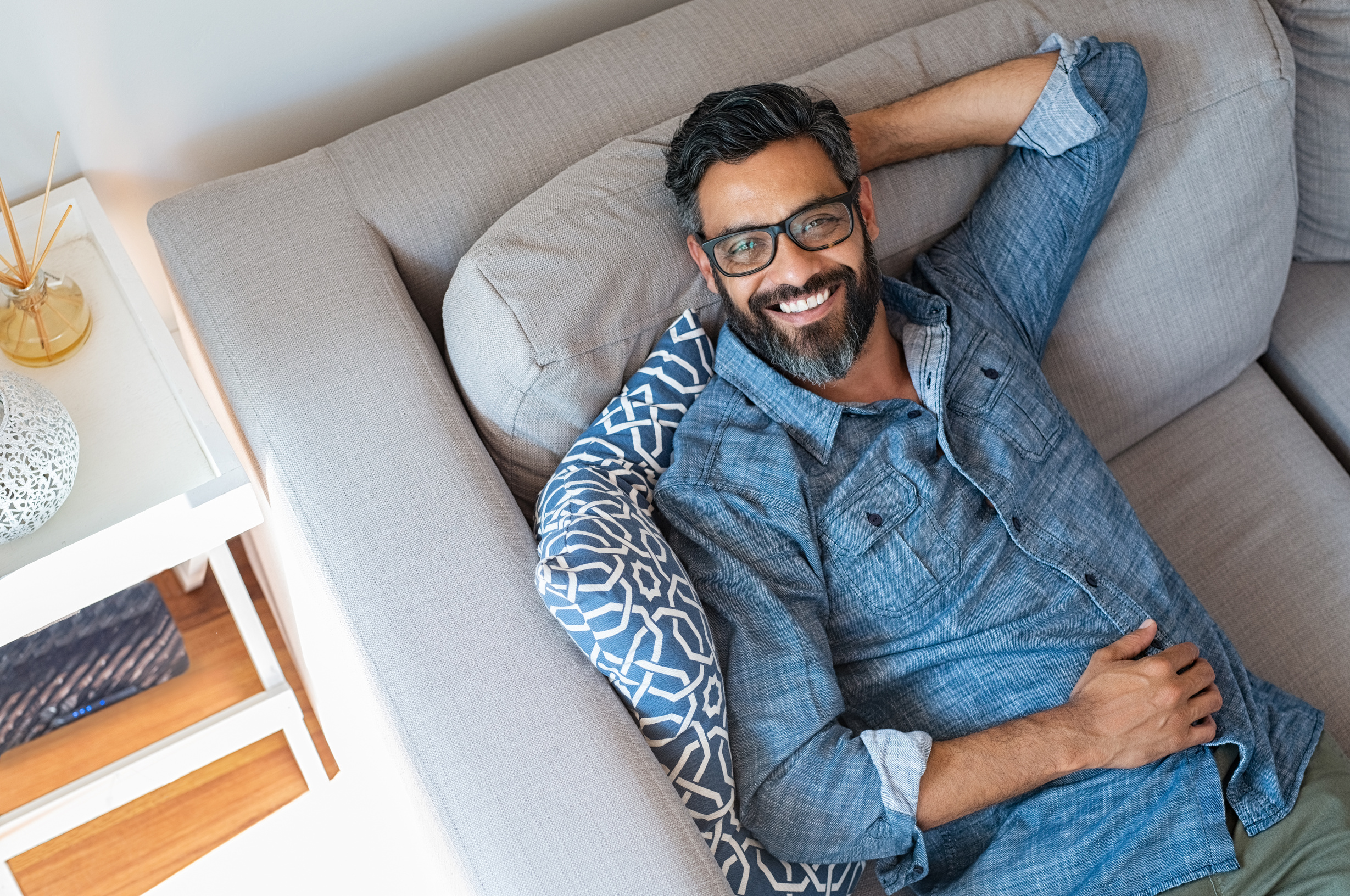Smiling Man Relaxing at Home